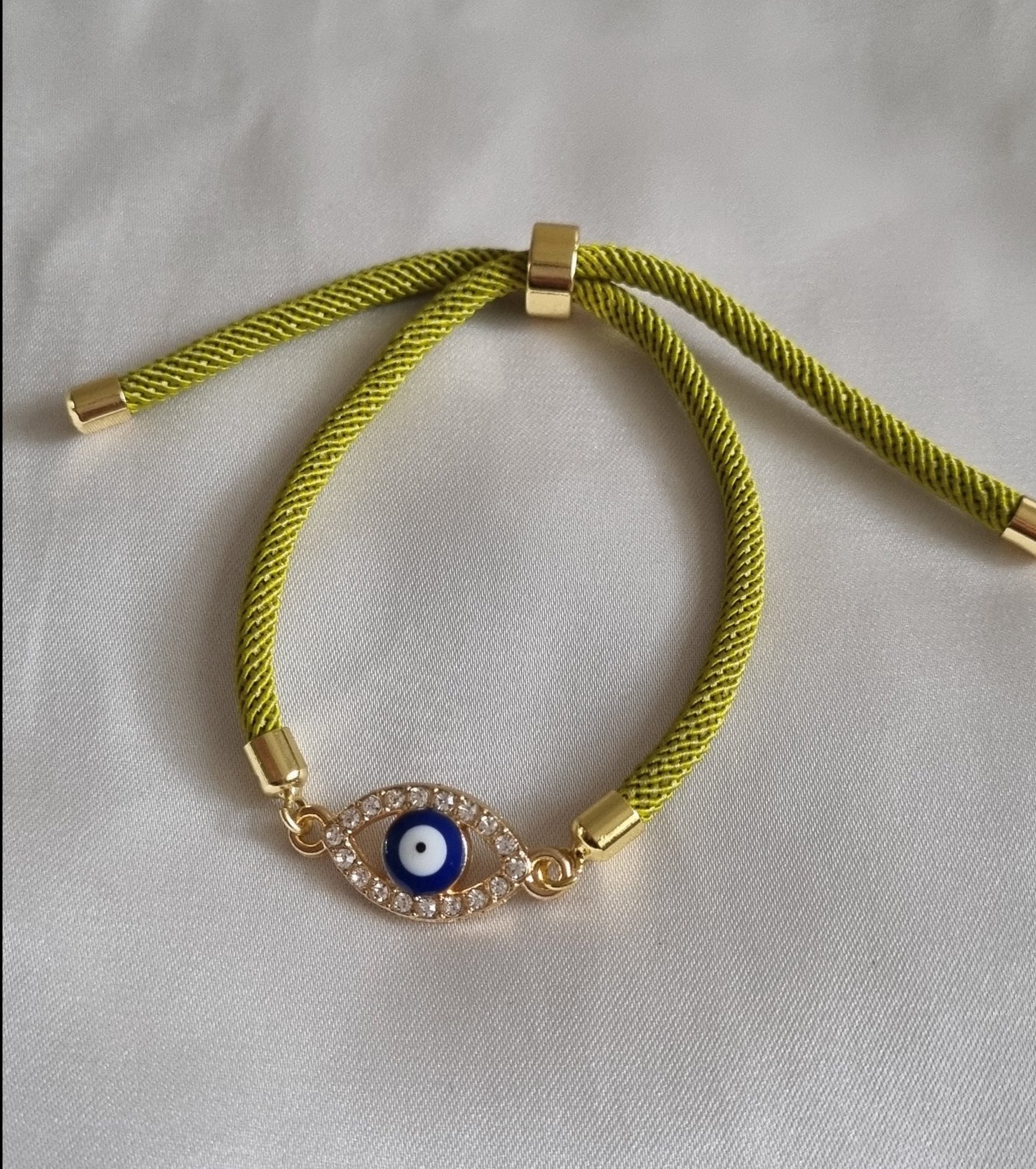 olive green mal de ojo bracelet